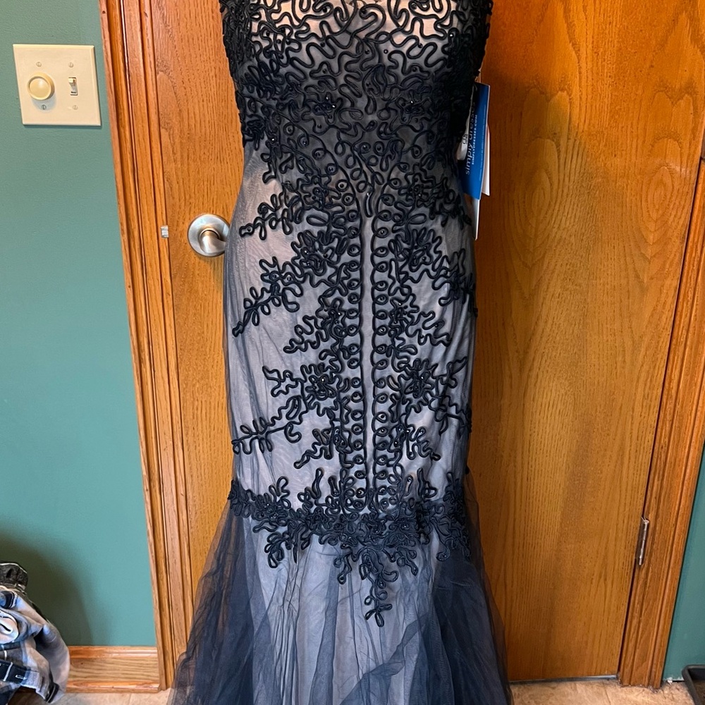 Beautiful navy with cream underlay gown. Perfect for mother of the bride or groo